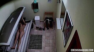 Shaved and Tight Pussy Caught in Solarium